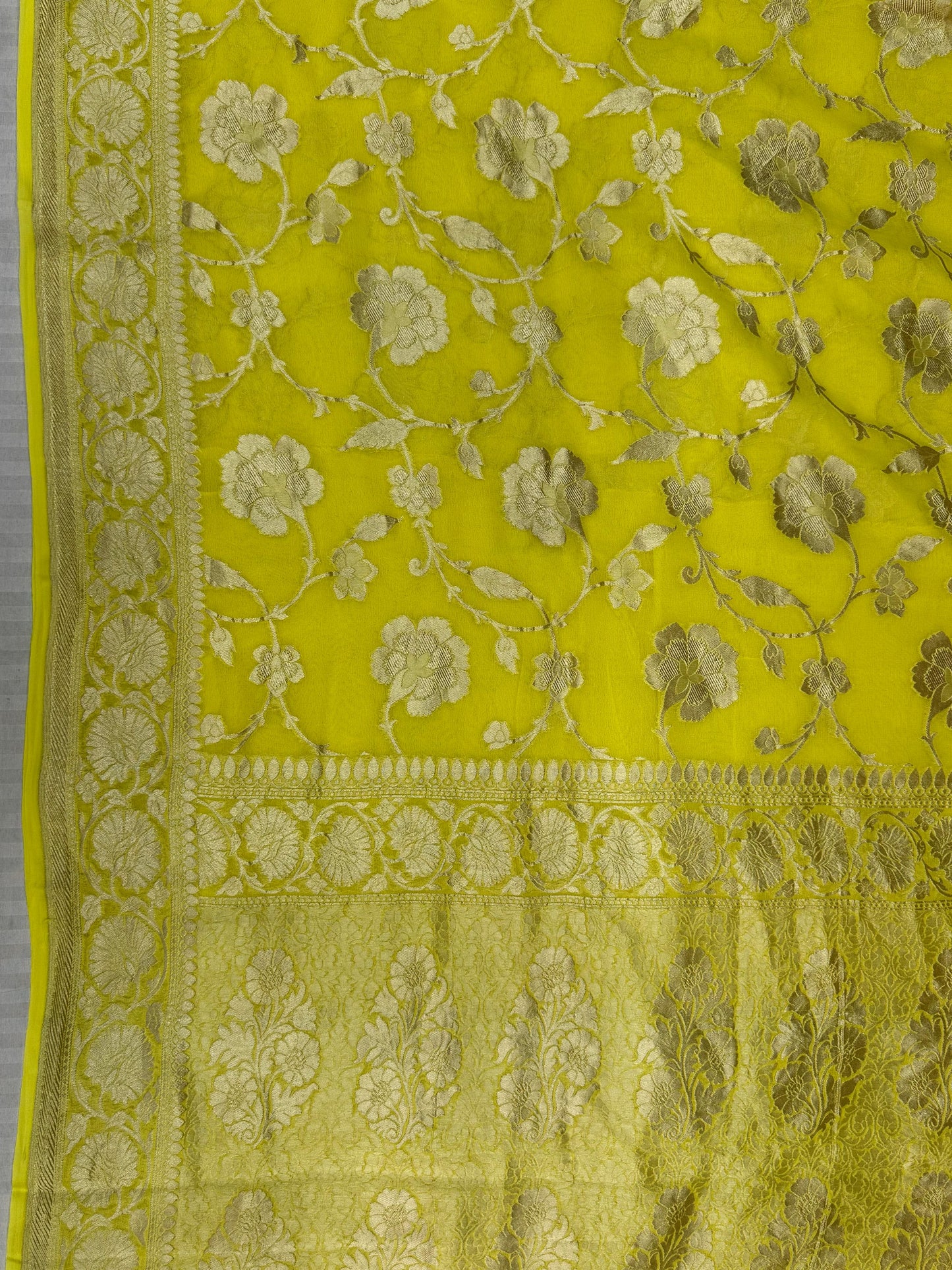 Pure Khaddi Georgette Saree in Lime Yellow with Antique Zari Floral Weave (Shabnami)